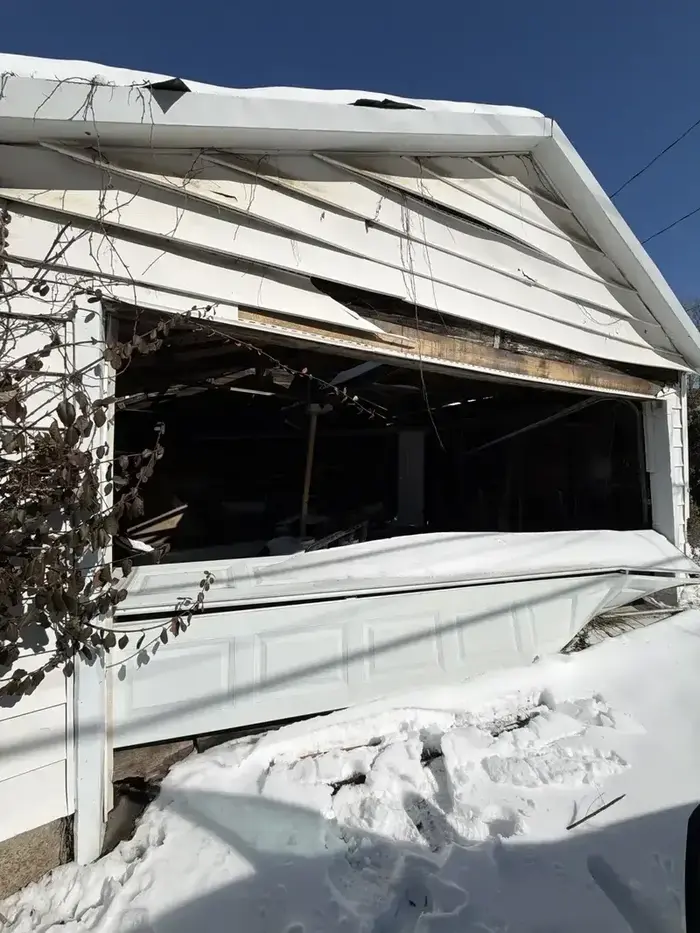 Snow damaged garage door emergency repair St. Louis MO