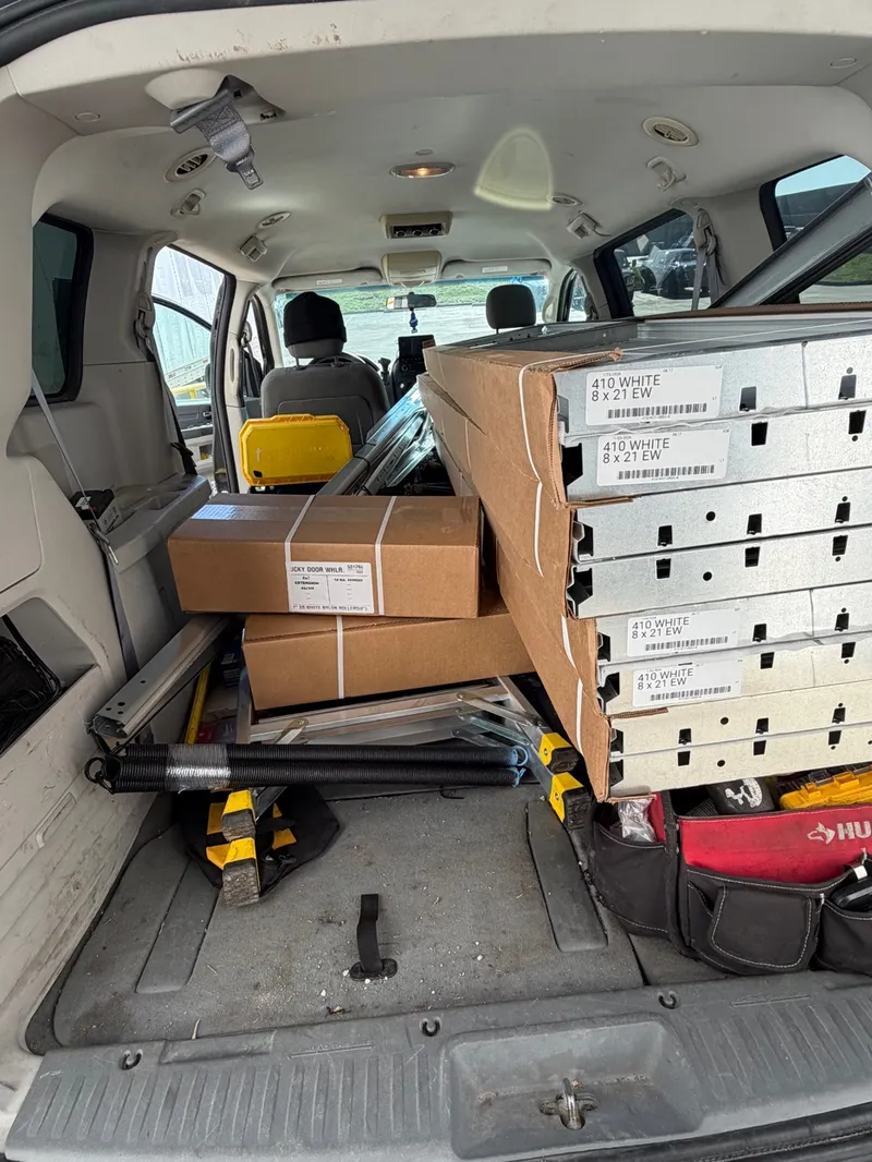 314 Garage Door Services fully stocked van with parts springs panels St. Louis MO